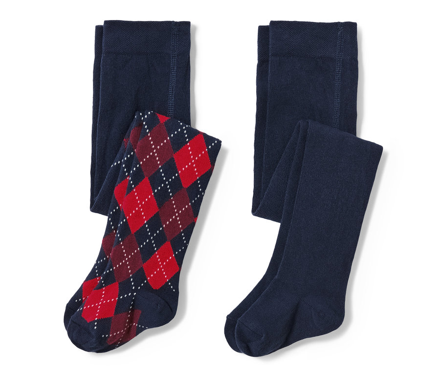 Dvoje detské pančuchové nohavice s kosoštvorcovým vzorom.