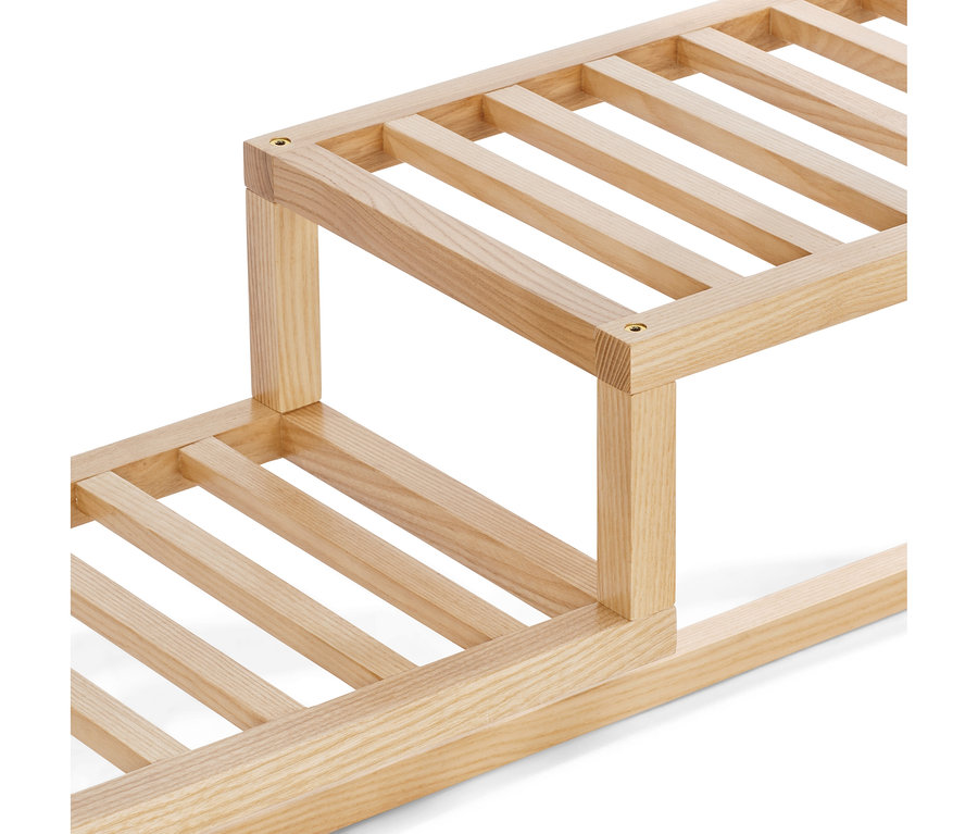 Detail konzolového stolíka so zásuvkami.