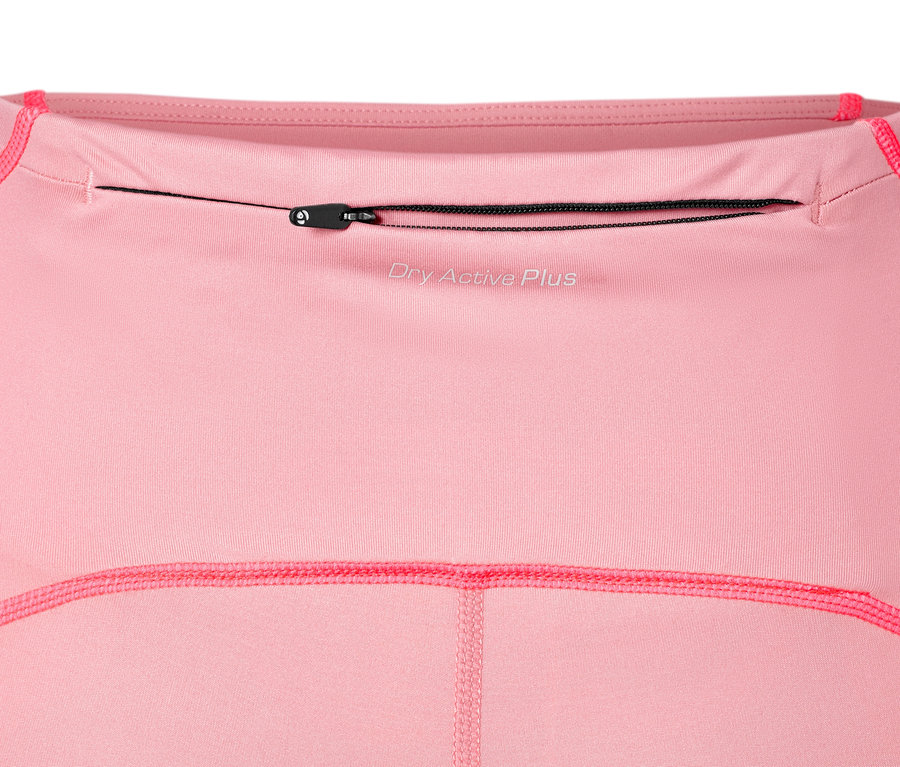 Detail ružových športových legínsov s vreckom na zips.