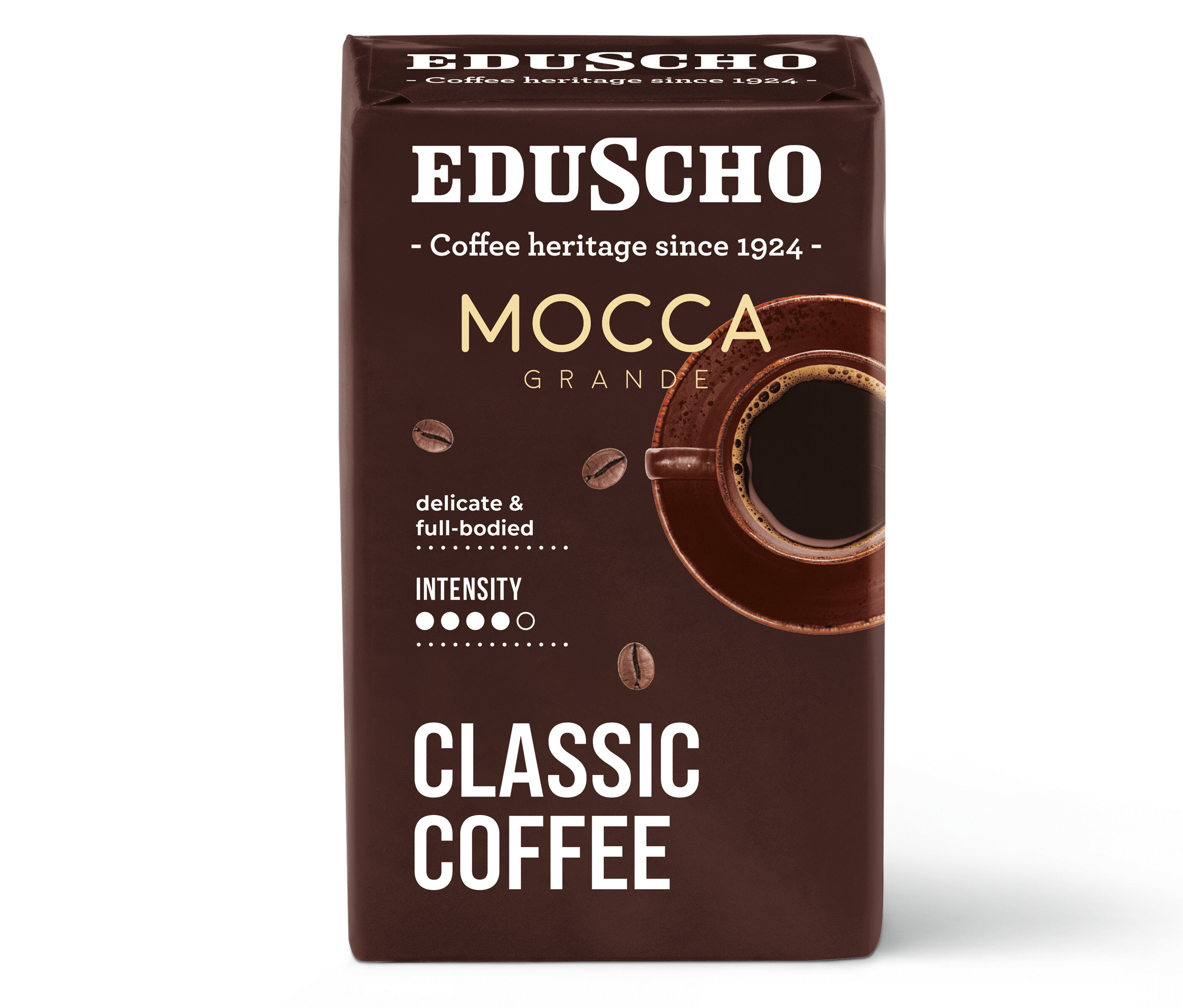 Balenie mletej kávy Eduscho Mocca Grande s šálkou kávy.