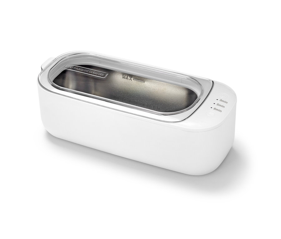 Biely ultrazvukový čistič s priehľadným vekom.