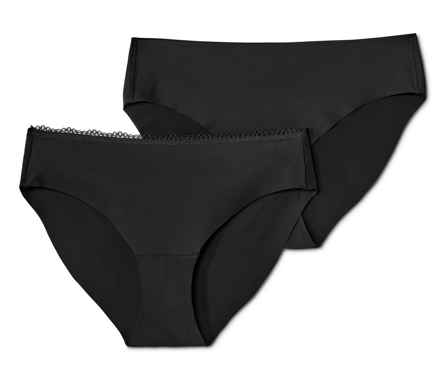 Dvoje čierne nohavičky Magic Cut na sebe.