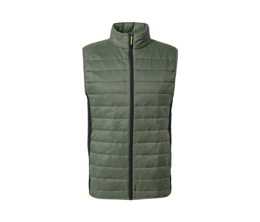 Zelená prešívaná vesta »pack light« s čiernym zipsom uprostred.
