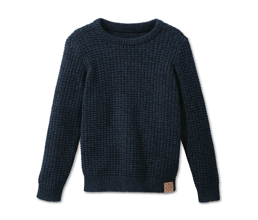 Detailný záber na pletený pulóver.