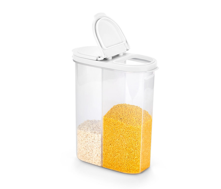 Priehľadná dóza na potraviny 2 v 1 s otvoreným vekom, naplnená z jednej polovice vločkami a z druhej polovice žltými cestovinami.