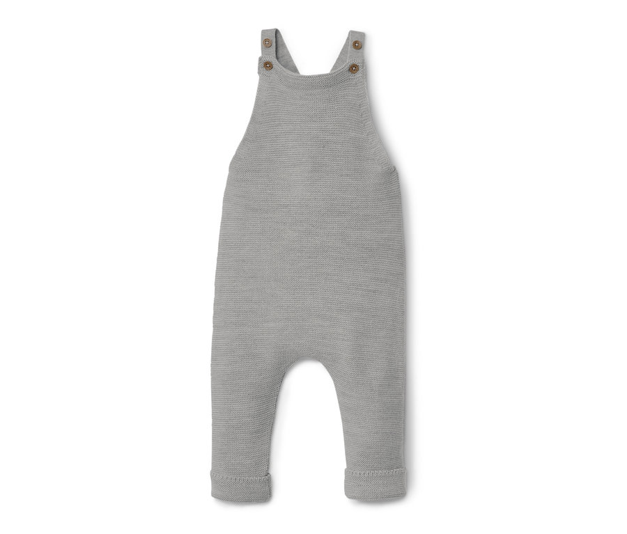 Sivé dojčenské nohavice na traky z merino vlny ležia na bielom pozadí.