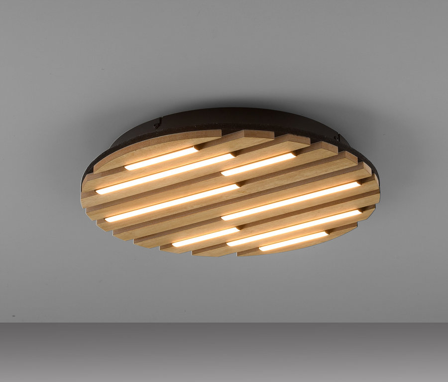 Kruhové stropné svietidlo s drevenými lamelami a LED pásikmi.
