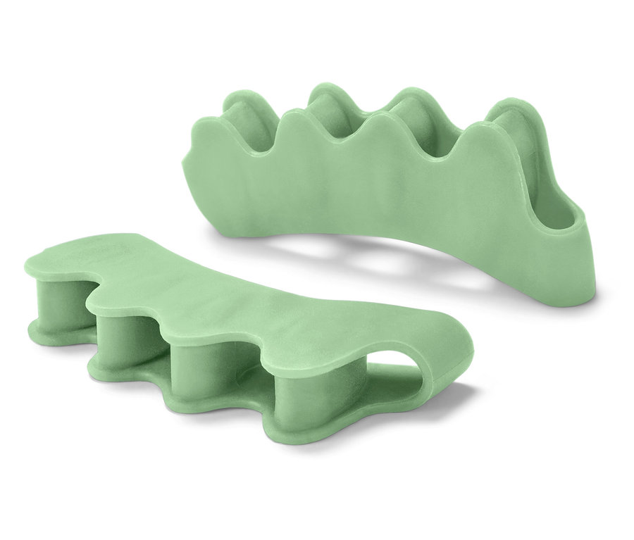 Dva zelené separátory prstov na nohách.