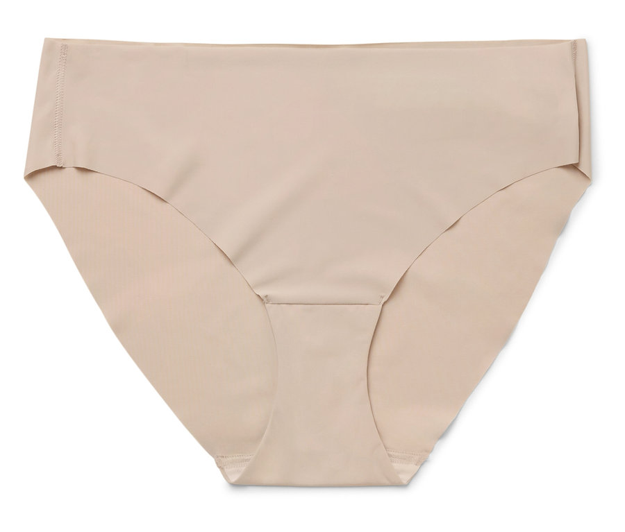 Detailný záber béžových nohavičiek na bielom pozadí.