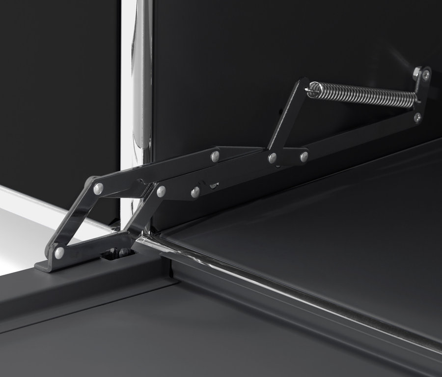 Detail mechanizmu výklopných dvierok čiernej skrinky CN3.