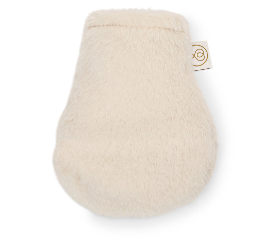 Mini-Wärmflasche leží na bielom pozadí.