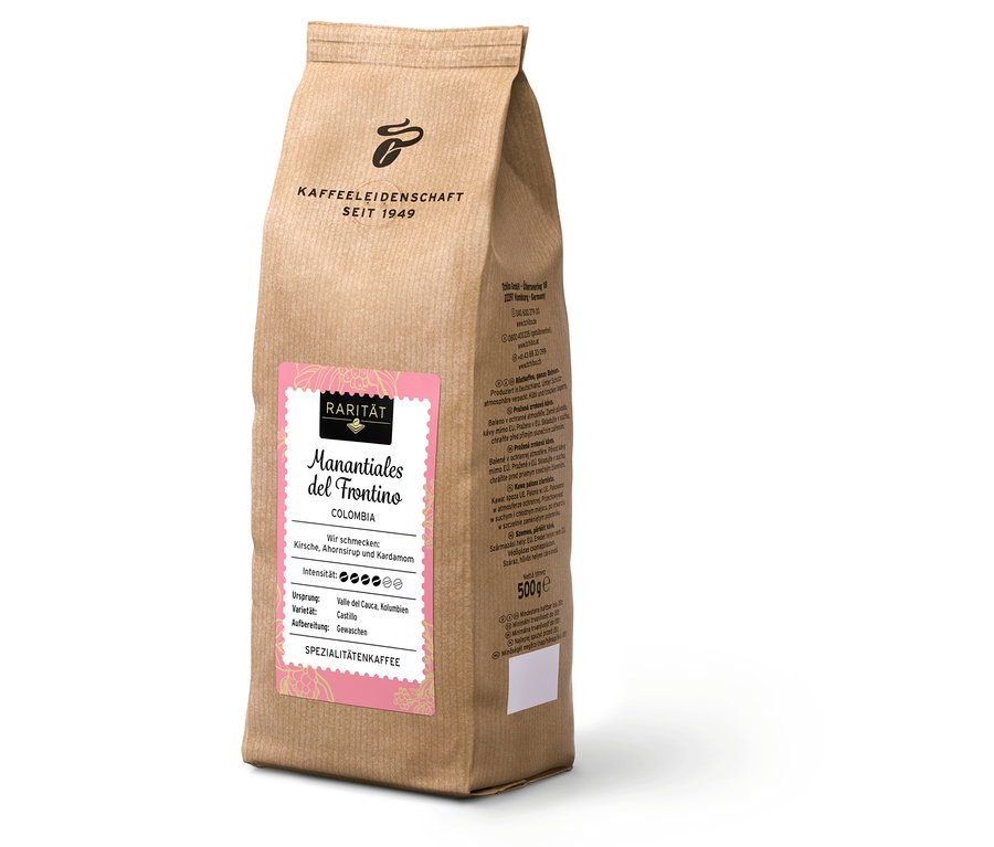 Balenie kávy Manantiales del Frontino Colombia na bielom pozadí.