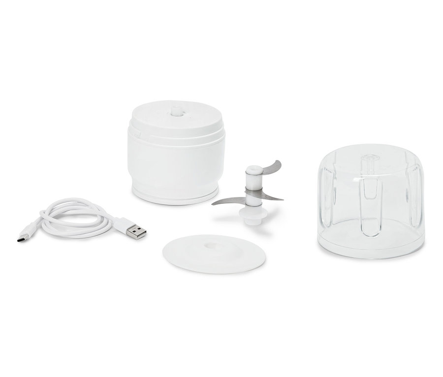 Časti bieleho mini sekáčika, vrátane nádoby, veka, čepele, USB kábla a priehľadnej misky.