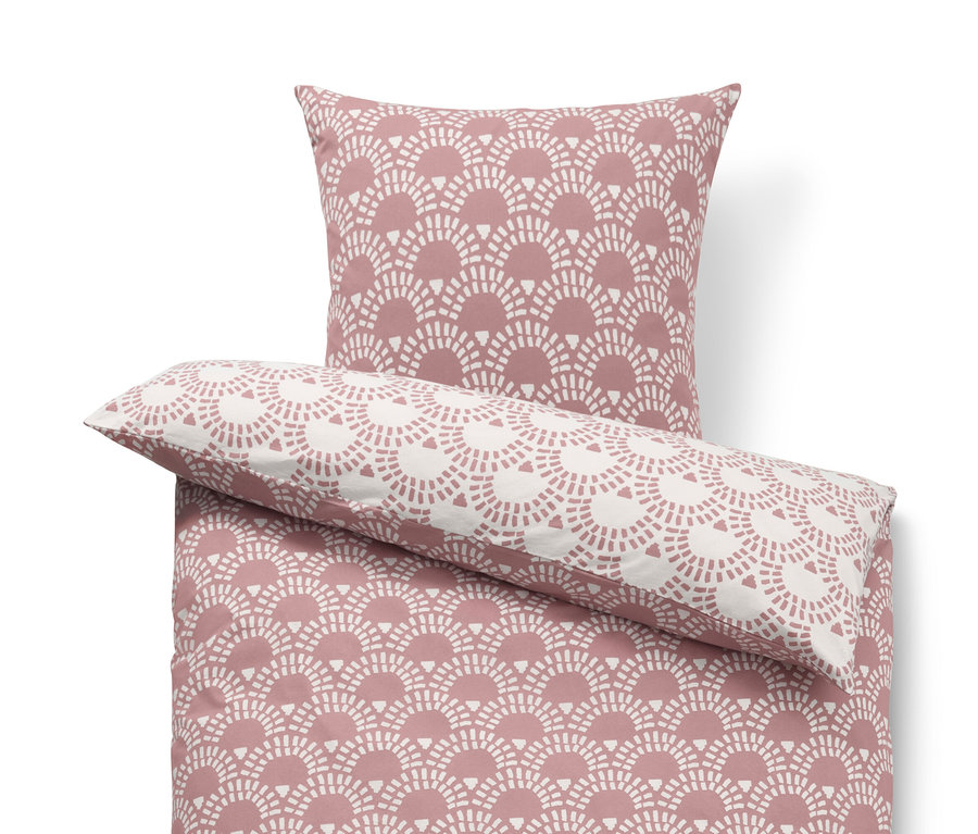 Ružová džersejová posteľná bielizeň štandardnej a nadmernej veľkosti s geometrickým vzorom.