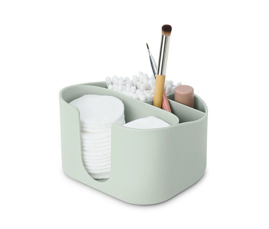 Svetlozelený organizér na kozmetiku s vatovými tampónmi, vatovými tyčinkami a štetcami na make-up.