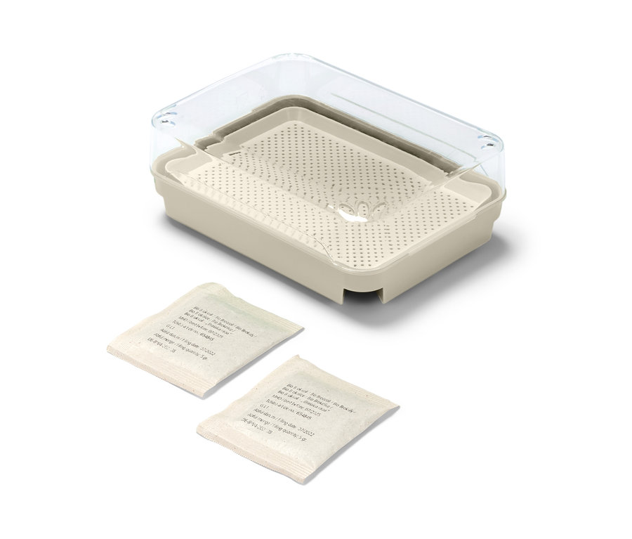 Súprava na pestovanie klíčkov s priehľadným vekom a dvoma balíčkami semien.