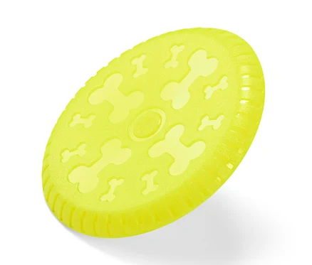 Žltý lietajúci tanier pre psy s potlačou kostí.