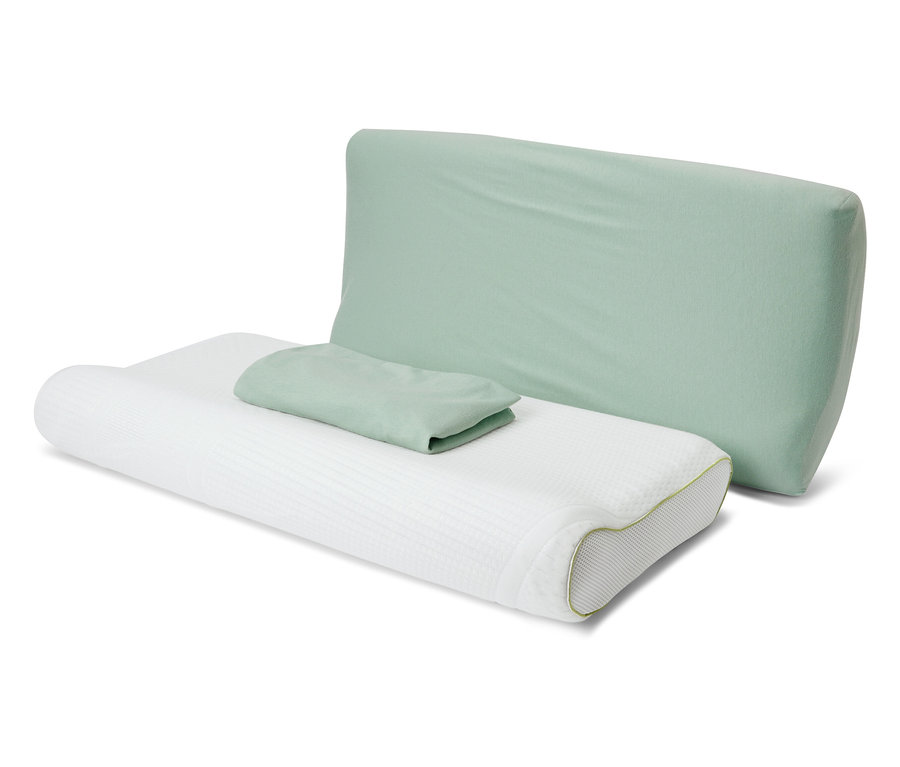 Dva zelené džersejové obliečky na krčný vankúš ležia na bielom vankúši.