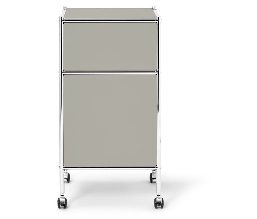 Sivý kontajner na kolieskach s dvomi zásuvkami a chrómovaným rámom.