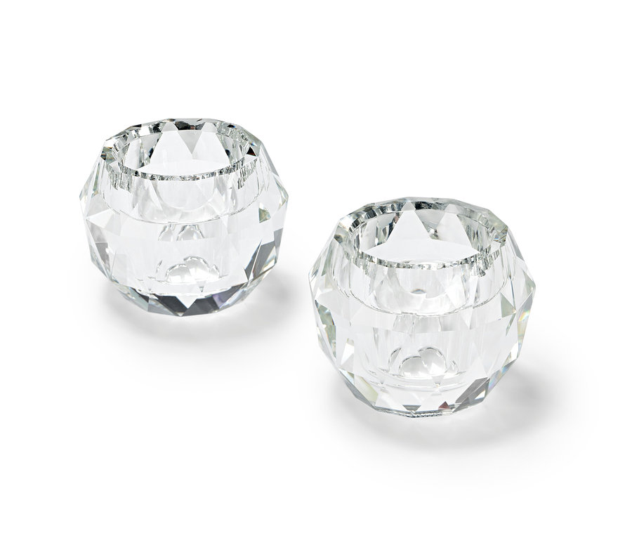 Dva sklenené svietniky.