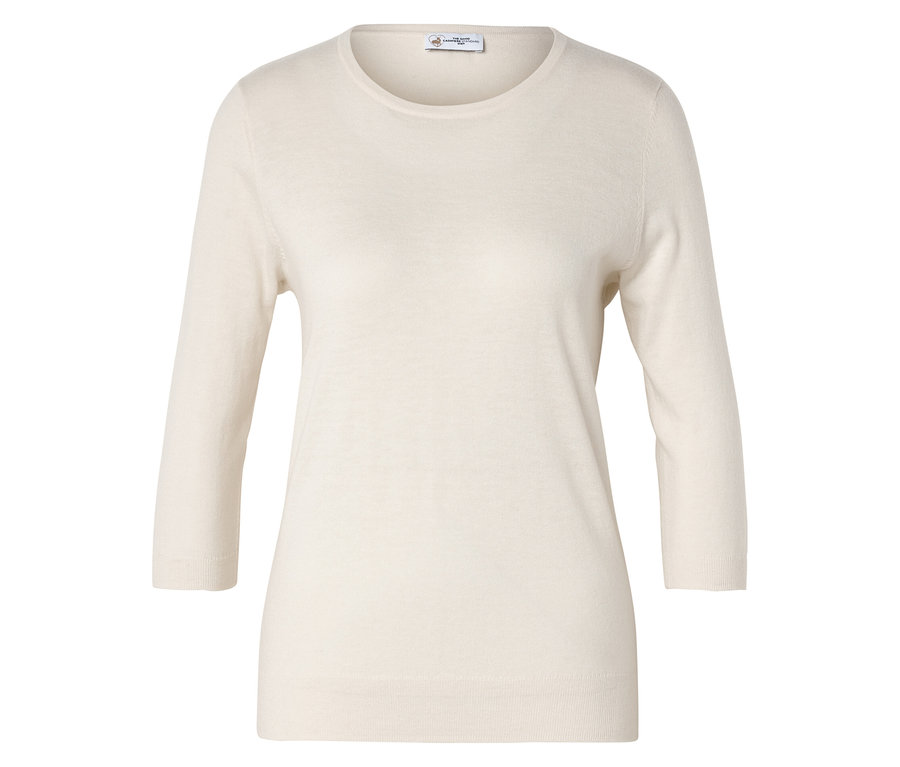 Krémový sveter s trojštvrťovými rukávmi leží naplocho.