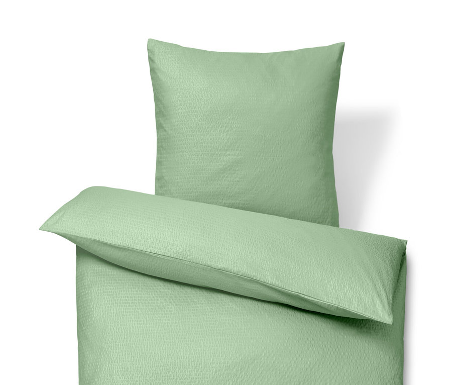 Zelená krepová posteľná bielizeň štandardnej veľkosti a krepová posteľná bielizeň nadmernej veľkosti.