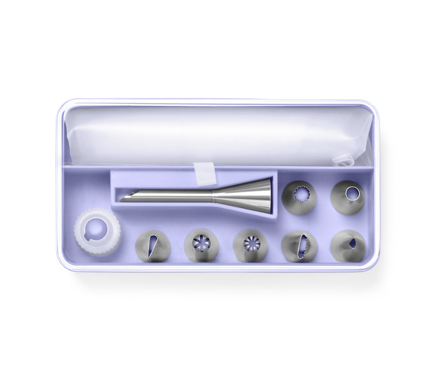 Súprava zdobiacich špičiek v lila puzdre.