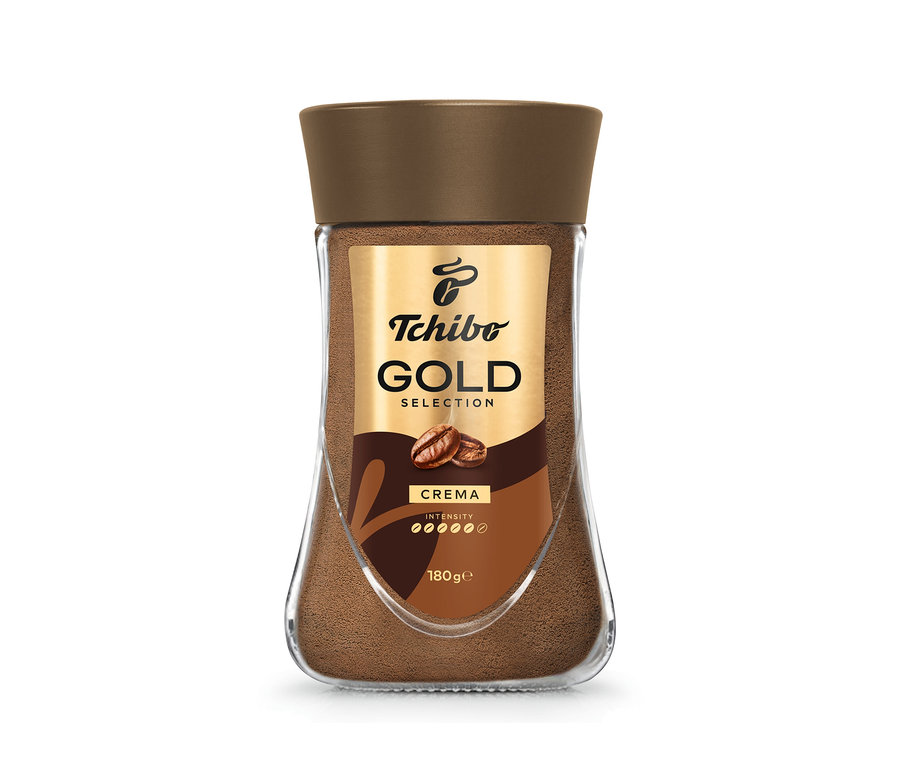 Sklenená nádoba instantnej kávy Tchibo Gold Selection.