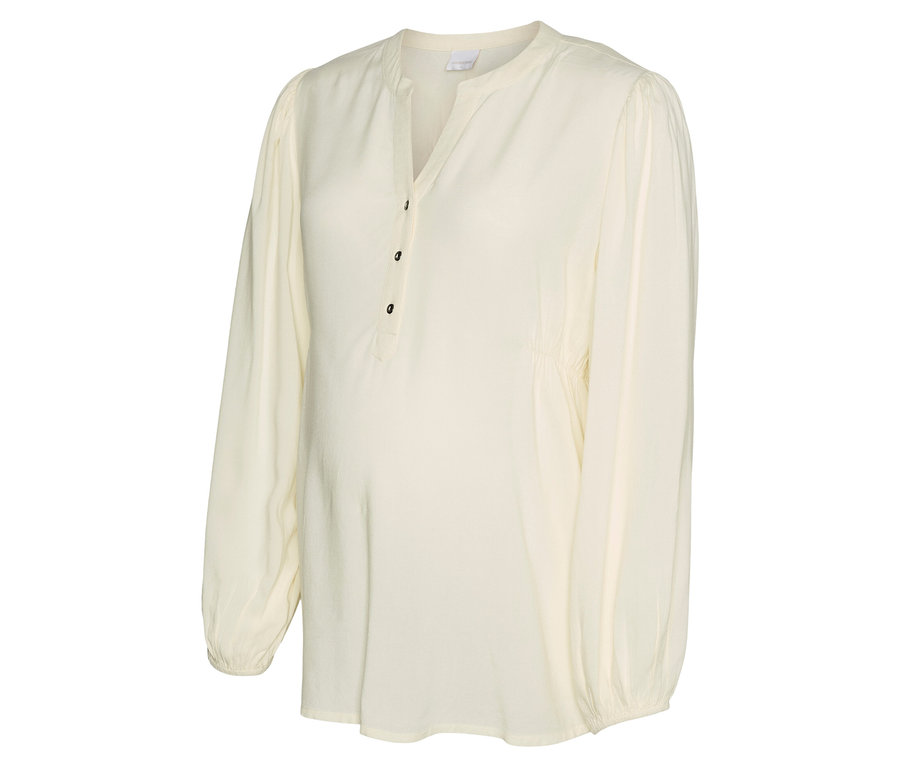 Na bielom pozadí je krémová blúzka MAMALICIOUSMLMERCY LIA L/S WO TOP 2F NOOS.