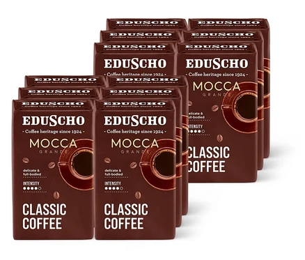 Balíčky mletej kávy Eduscho Mocca Grande usporiadané v niekoľkých radoch.