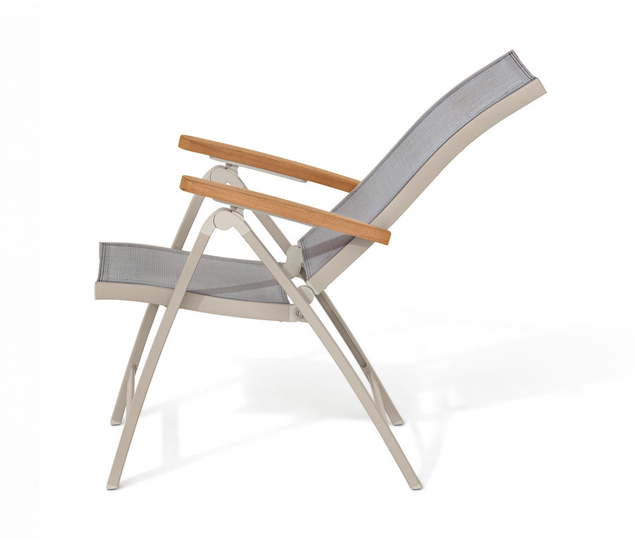 Bočný pohľad na kreslo »Liska« s vysokým nastaviteľným operadlom.