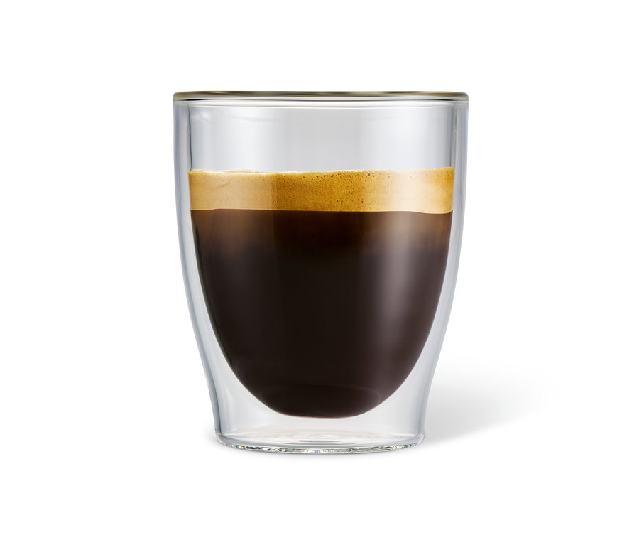 Káva caffè crema v šálke na caffè crema.