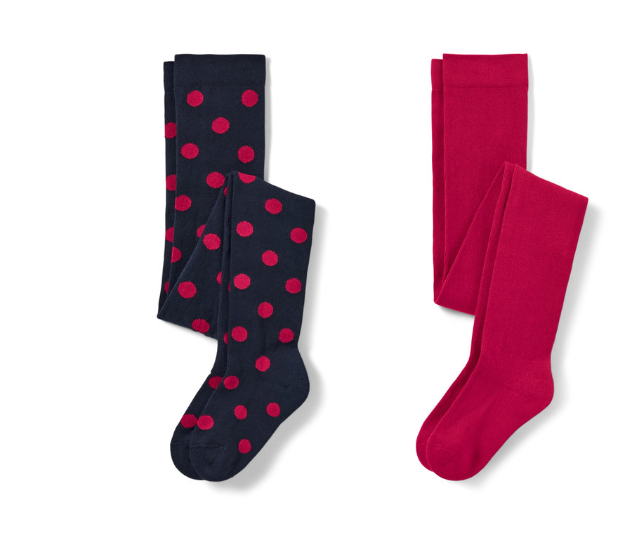 Dvoje detské pančuchy: jedny tmavomodré s červenými bodkami a jedny červené.