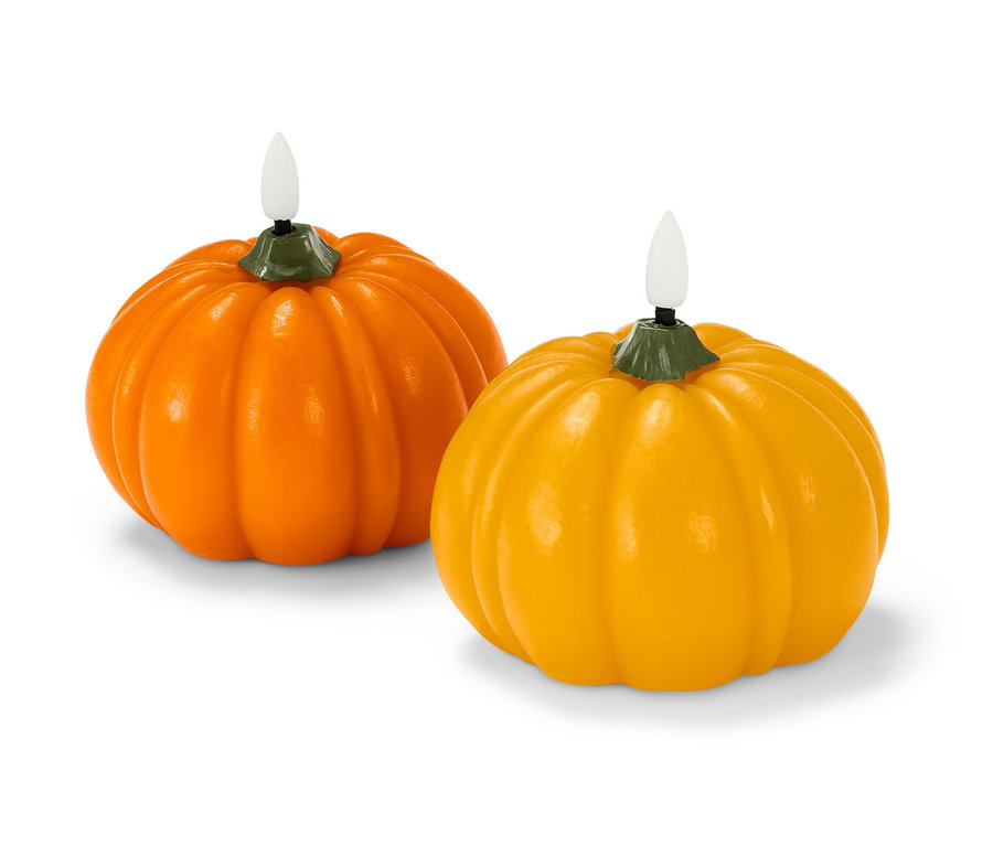 Dve LED sviečky z pravého vosku v tvare tekvice.
