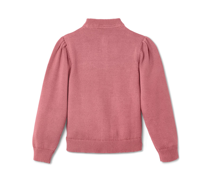 Detail detského svetrika v ružovej farbe.