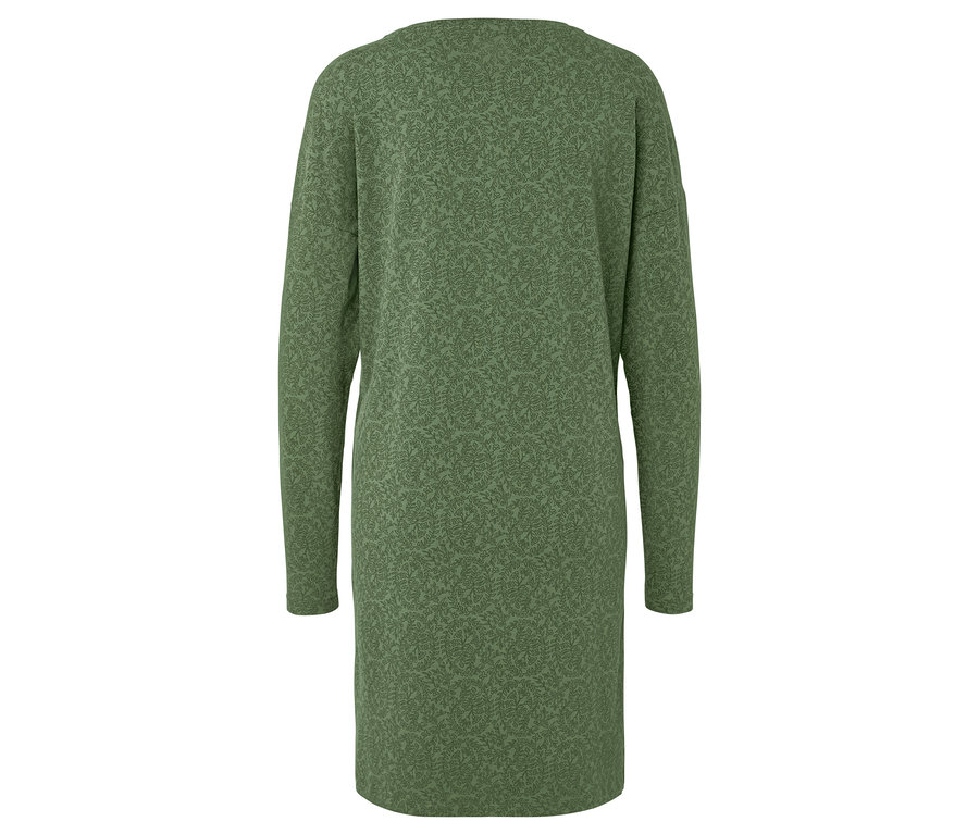 Zozadu je vidieť zelené šaty s dlhými rukávmi a potlačou listov.