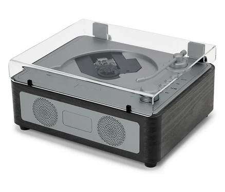 Reproduktor CD/Bluetooth® s priehľadným krytom stojí na bielom povrchu.