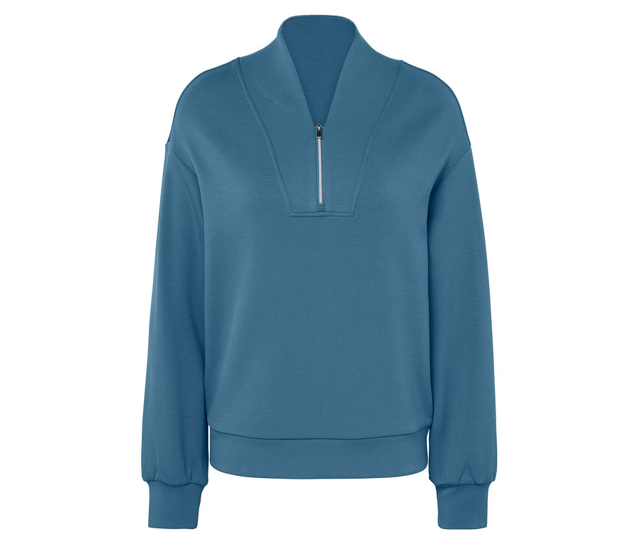 Modrá mikina s dlhými rukávmi a krátkym zipsom.