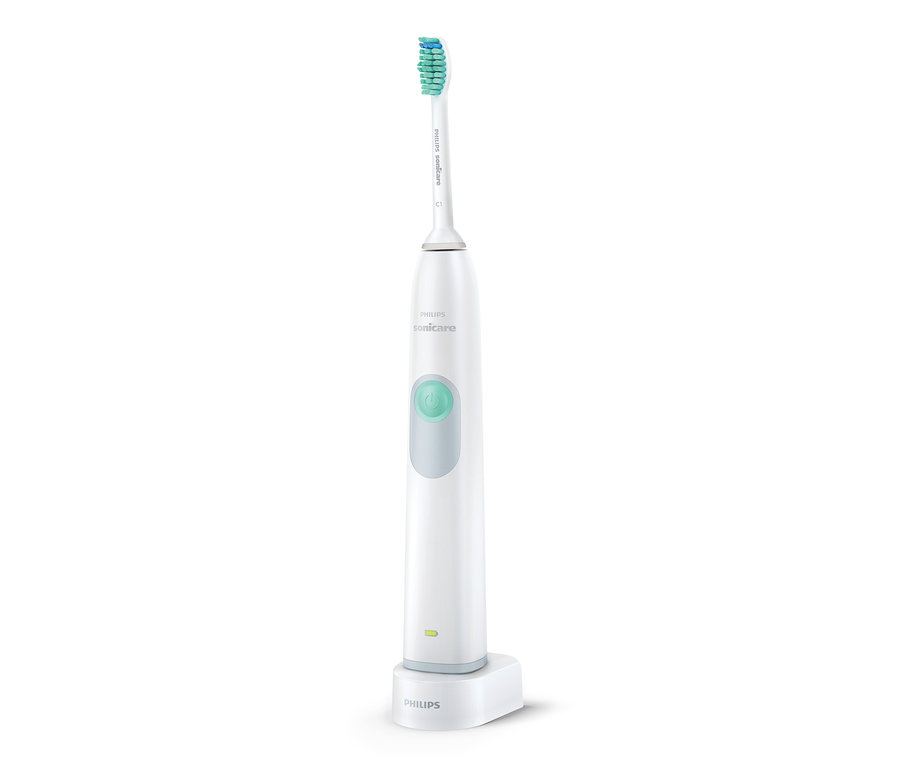 Elektrická sonická zubná kefka Philips HX6221/21 »DailyClean 3100« v bielej farbe na nabíjacej základni.