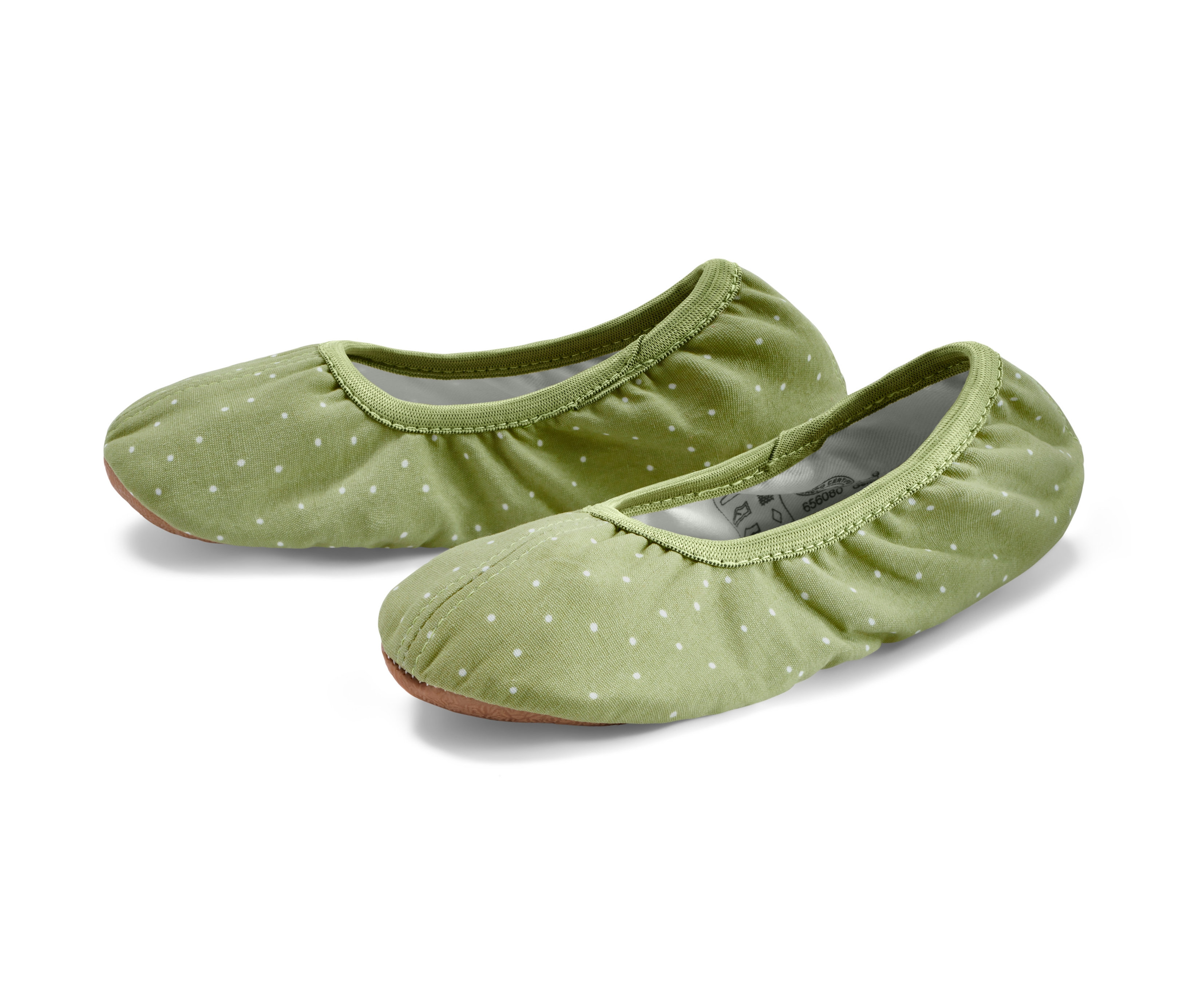 Dvoje detské gymnastické cvičky svetlozelenej farby s bielymi bodkami.