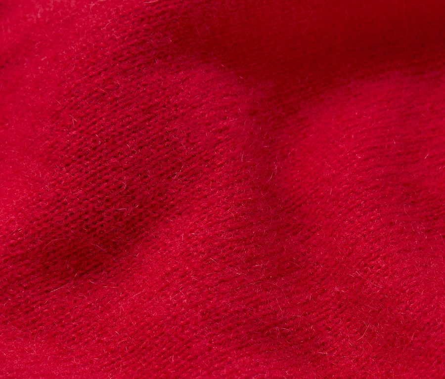 Detail červenej látky.