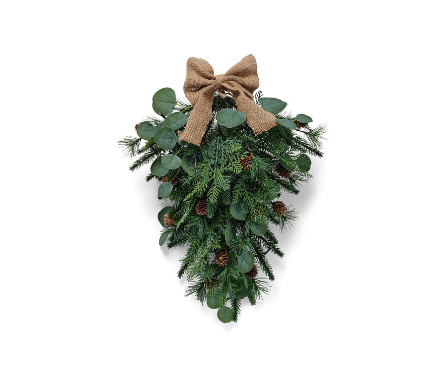 Zelená LED dekorácia na dvere s hnedou mašľou a šiškami.