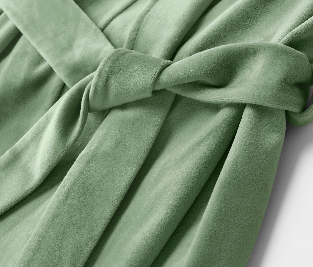 Detailný záber na svetlozelený župan so zaviazaným opaskom.