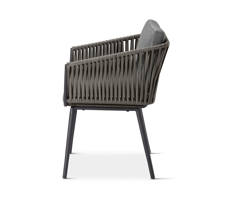 Bočný pohľad na jedálenské kreslo »Jara« s textilným pletivom.