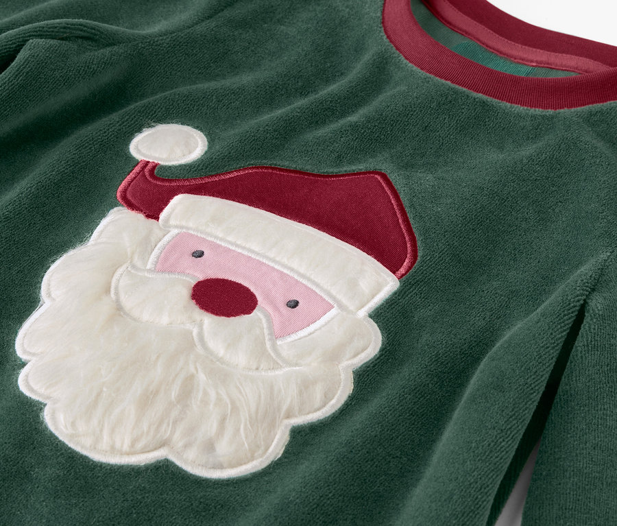 Zelený vianočný sveter s aplikáciou Santa Clausa.