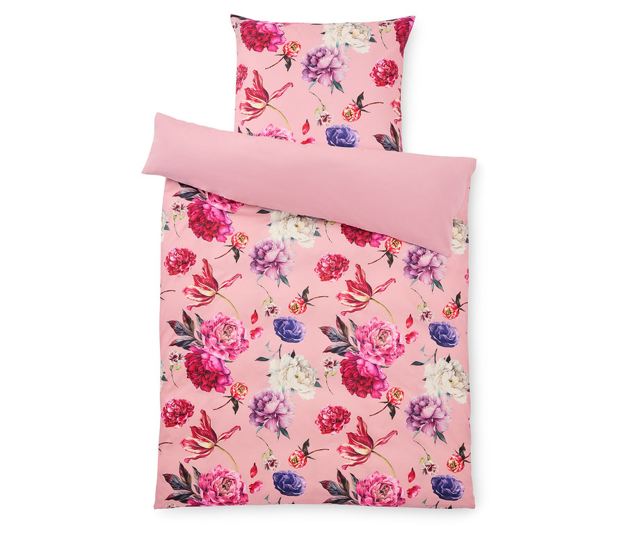 Ružová posteľná súprava s kvetinovým vzorom s vankúšom a obliečkou.