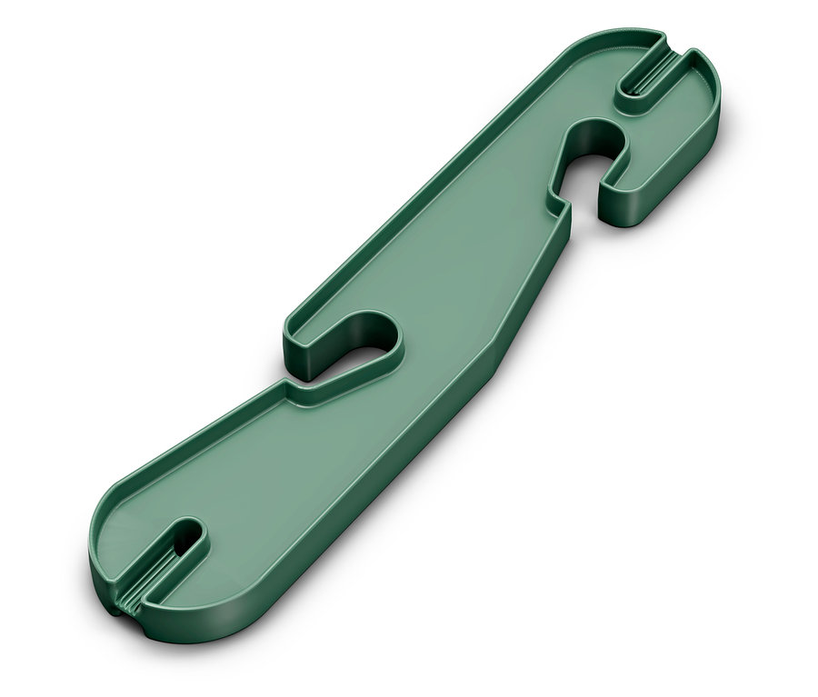Zelený plastový držiak kábla s otvormi.