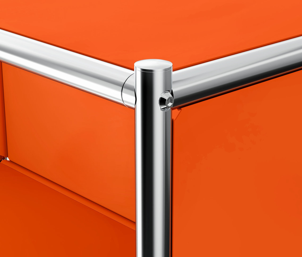 Detail oranžovej kovovej kancelárskej skrinky »CN3« s 3 zásuvkami.