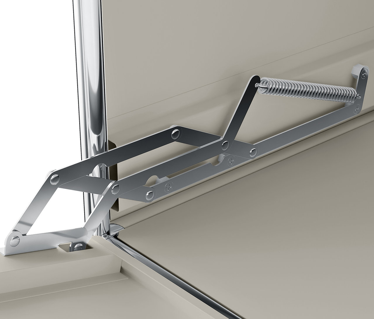 Detail strieborného mechanizmu s pružinou pripevneného k béžovej skrinke.