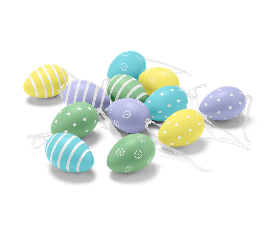 Sada dvanástich veľkonočných vajíčok s rôznymi vzormi a farbami.
